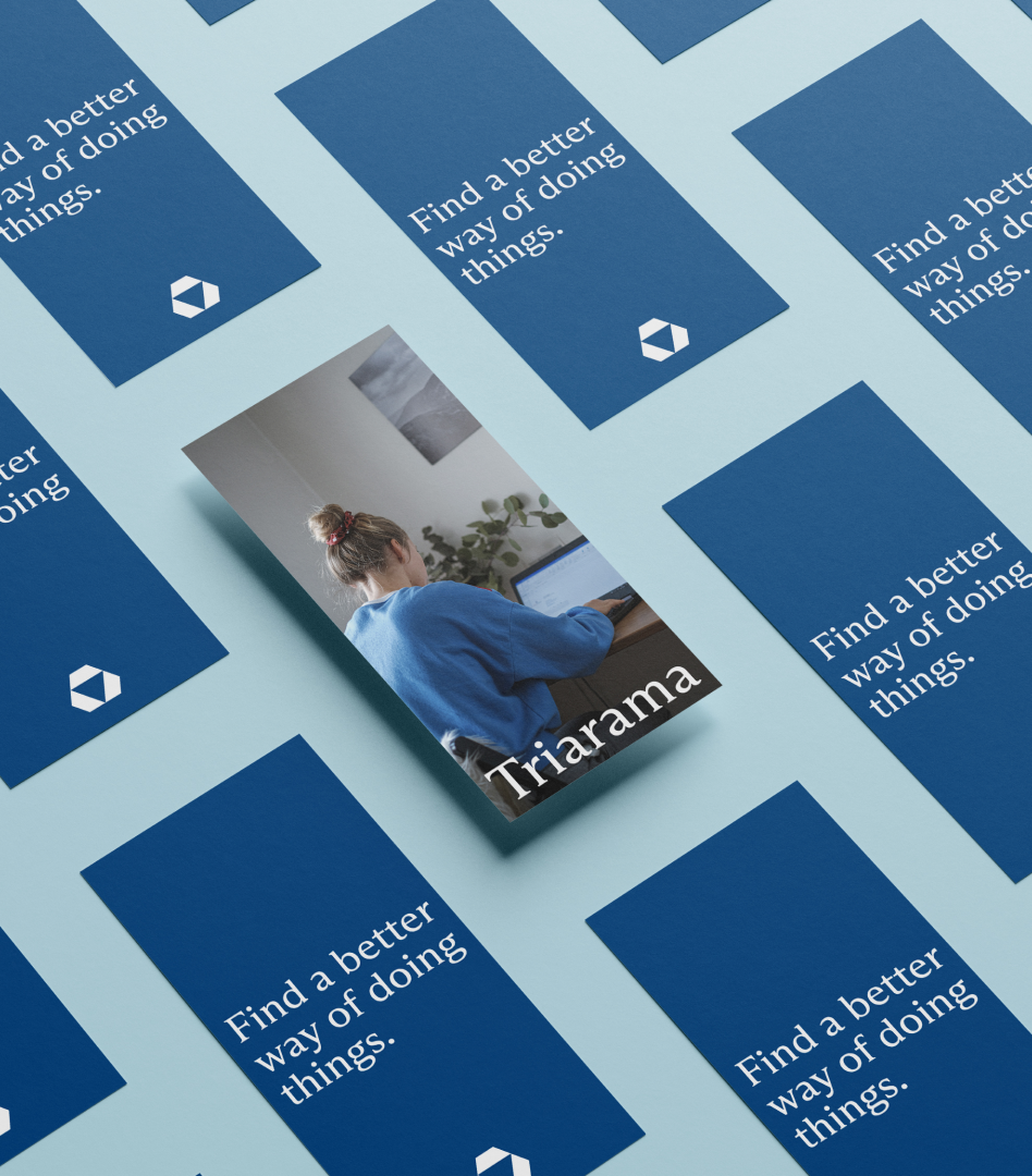 Blue one-sheet flyers organized in a grid. The back of the flyers say, "Find a better way of doing things."